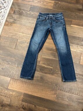 Buckle Men's Slim Jeans in Dark to Medium Blue Wash